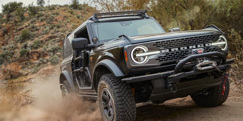 A Bronco making use of its G.O.A.T. modes to tear up the trails